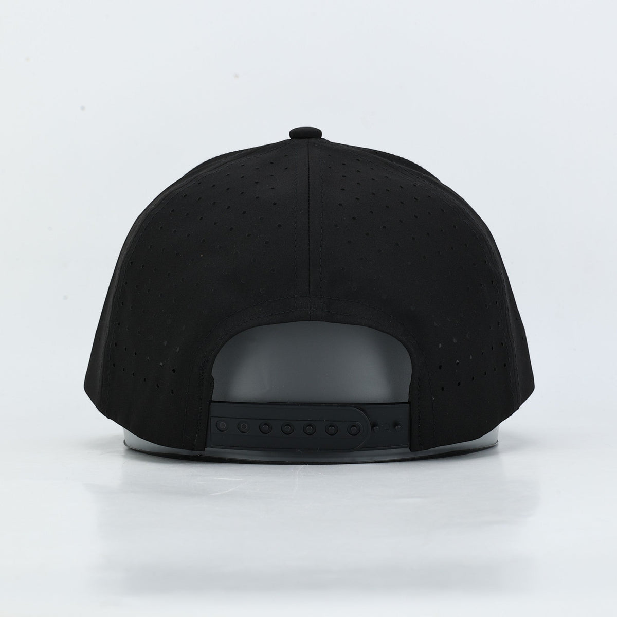Relic Rove black snapback hat with perforated fabric back panels for breathability, shown from the rear view.